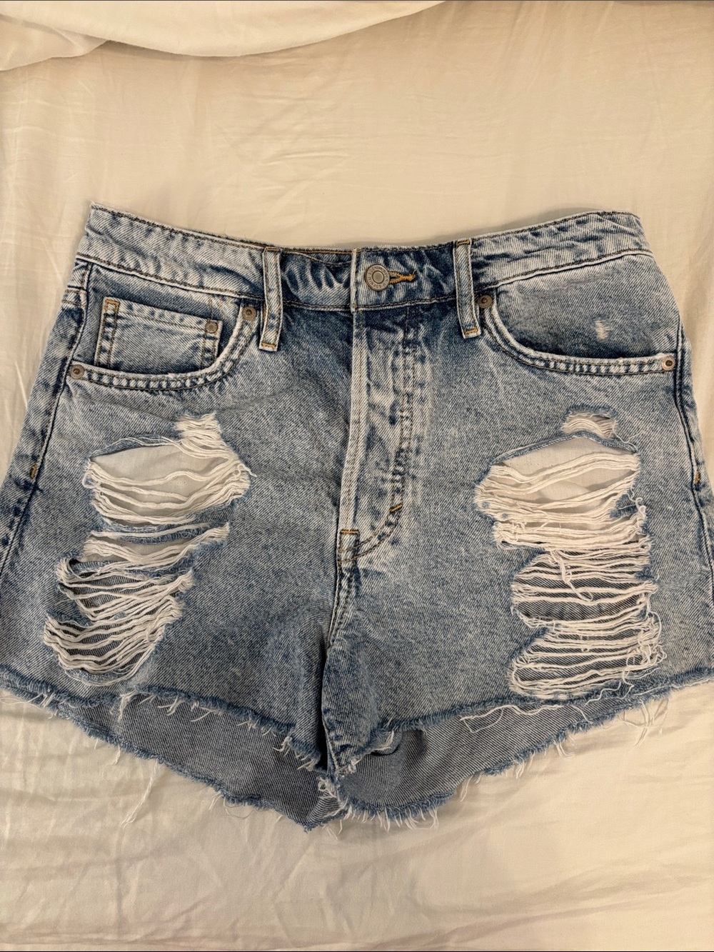 High-Rise Light Blue Distressed Denim Shorts